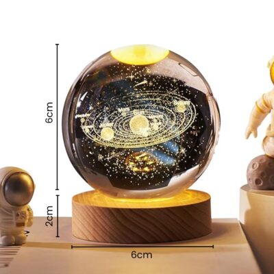 📦 Package Includes – 1 x 3D Crystal Ball Night Lamp with USB Connector, 6 LED Lights, Wooden Base, Warm White Glow. 📏 Size & Lighting Details – Crystal Ball: 6 cm | Wooden Base: 2 cm | Features 6 Warm White LEDs with convenient USB power supply. 🔮 Premium K10 Crystal Quality – Crafted from high-grade K10 crystal for exceptional transparency, purity, and zero bubbles or impurities. 🌌 Elegant Removable Night Light – A beautiful addition to bedrooms, living rooms, studies, or offices. Especially ideal for kids’ rooms or as a charming night lamp for stargazers and science lovers. 🎁 Ideal for All Gift Occasions – Makes a thoughtful gift for kids, teens, friends, boyfriends, girlfriends, teachers, and family. Perfect for birthdays, Valentine’s Day, anniversaries, Diwali, Christmas, New Year, Easter, Thanksgiving, housewarmings, and other festive occasions.