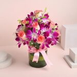 Flower Aura Premium Flower Bouquet of 12 Pink Roses & 4 Purple Flowers In Glass Vase For Birthday Gift, Anniversary Gift, Mother's Day Gift, Love & Romance Gift, Father's Day Gift (Same Day Delivery)